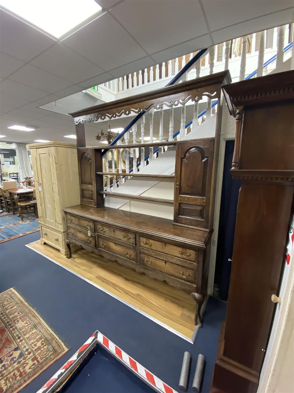 A late 18th century oak dresser, length 218cm, depth 46cm, height 228cm